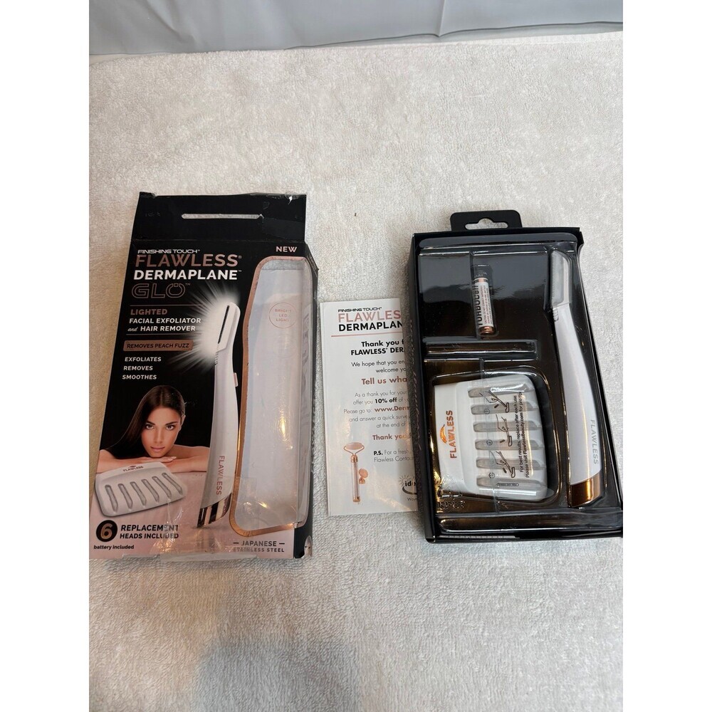 NIB Finishing Touch Flawless Dermaplane Glo Facial Exfoliator & Hair Remover